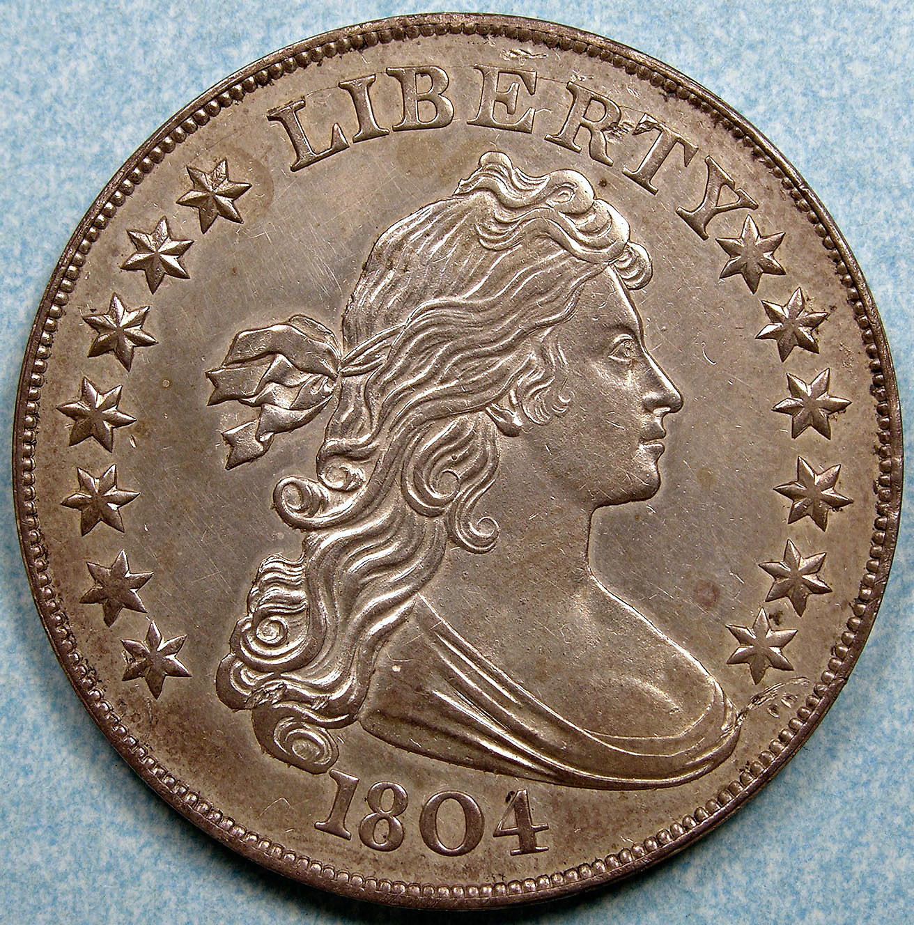 1 серебряный доллар. Монета 1804 Либерти. Серебряный доллар США, 1804 год. Америка монеты 1804. Серебряная монета Либерти 1804.